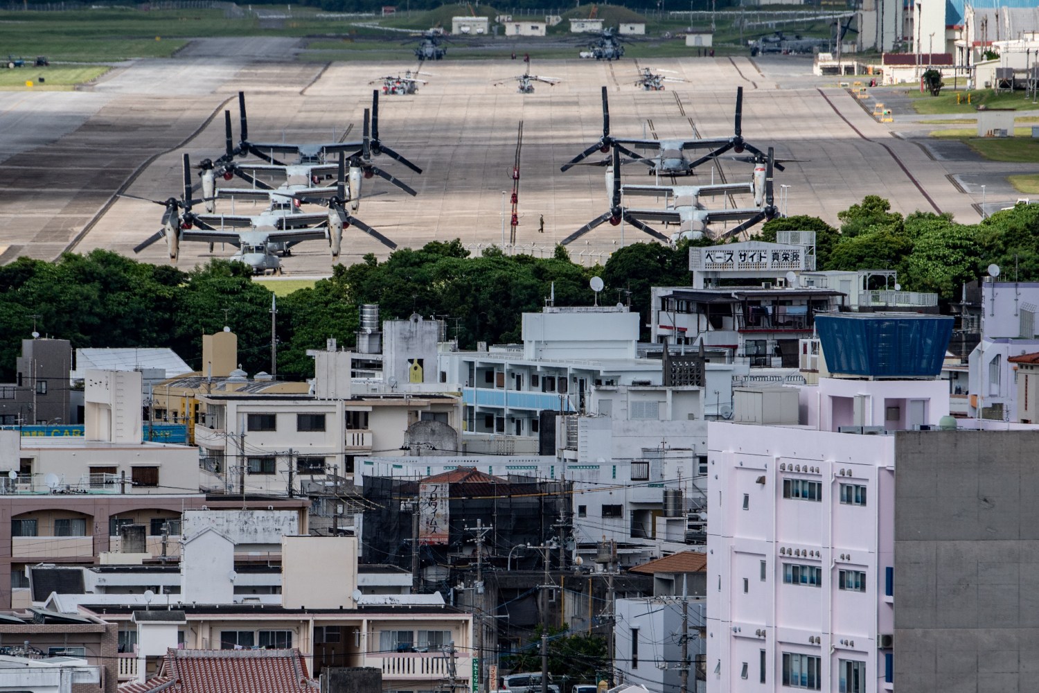 This picture taken on August 23, 2022 shows a general view of the US Marine Corps Air Station Futenma from Kakazutakadai Park in Ginowan, Okinawa prefecture. For decades, residents of Japan's Okinawa have strongly opposed the US military bases that dot the region, but a subtle shift is underway, driven by Chinese sabre-rattling and economic challenges. (Photo by PHILIP FONG / AFP) / TO GO WITH Japan-Okinawa-defence-US-China,FOCUS by Mathias CENA (Photo by PHILIP FONG/AFP via Getty Images)