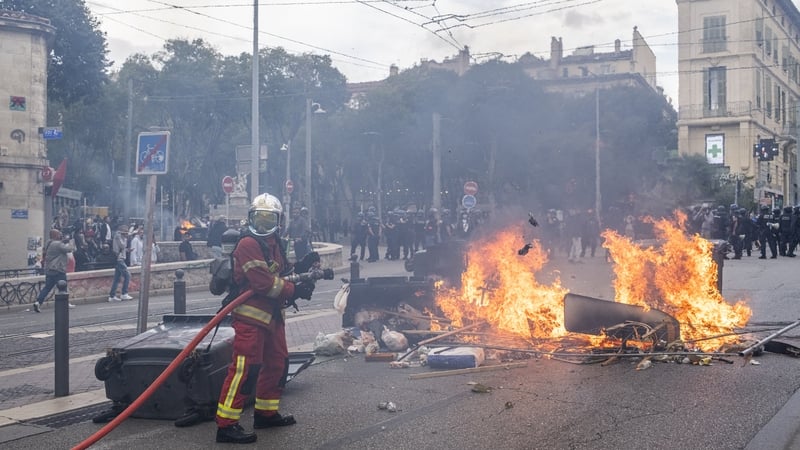 The crowd in Reforme Square sets the barricades on fire in Marseille, France