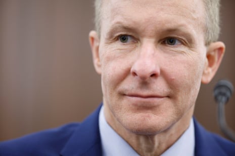 United Airlines CEO Scott Kirby, close-up, wearing a dark suit and tie