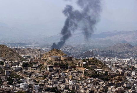 Smoke billows near the city of Taiz during battles between Yemeni government fighters and Iran-backed Houthis on Wednesday.